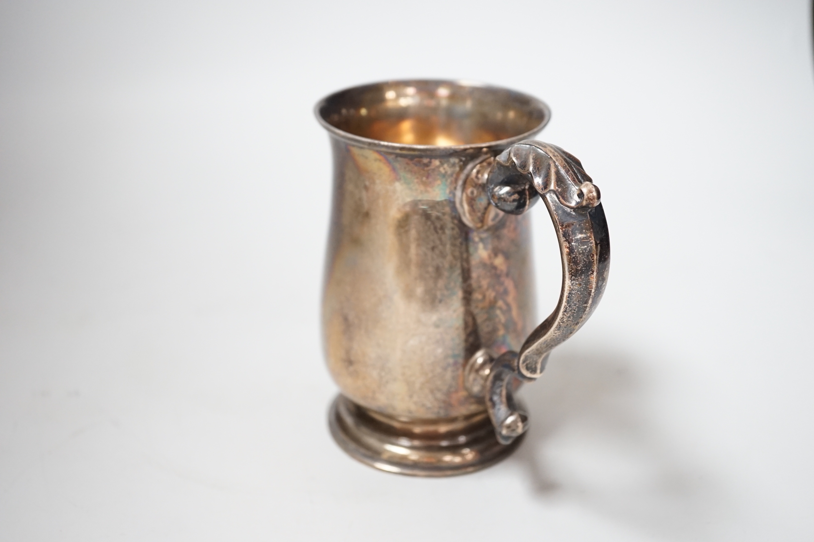 A George V silver baluster mug, Bravingtons Ltd, London, 1935, height 14cm, 10.1oz.